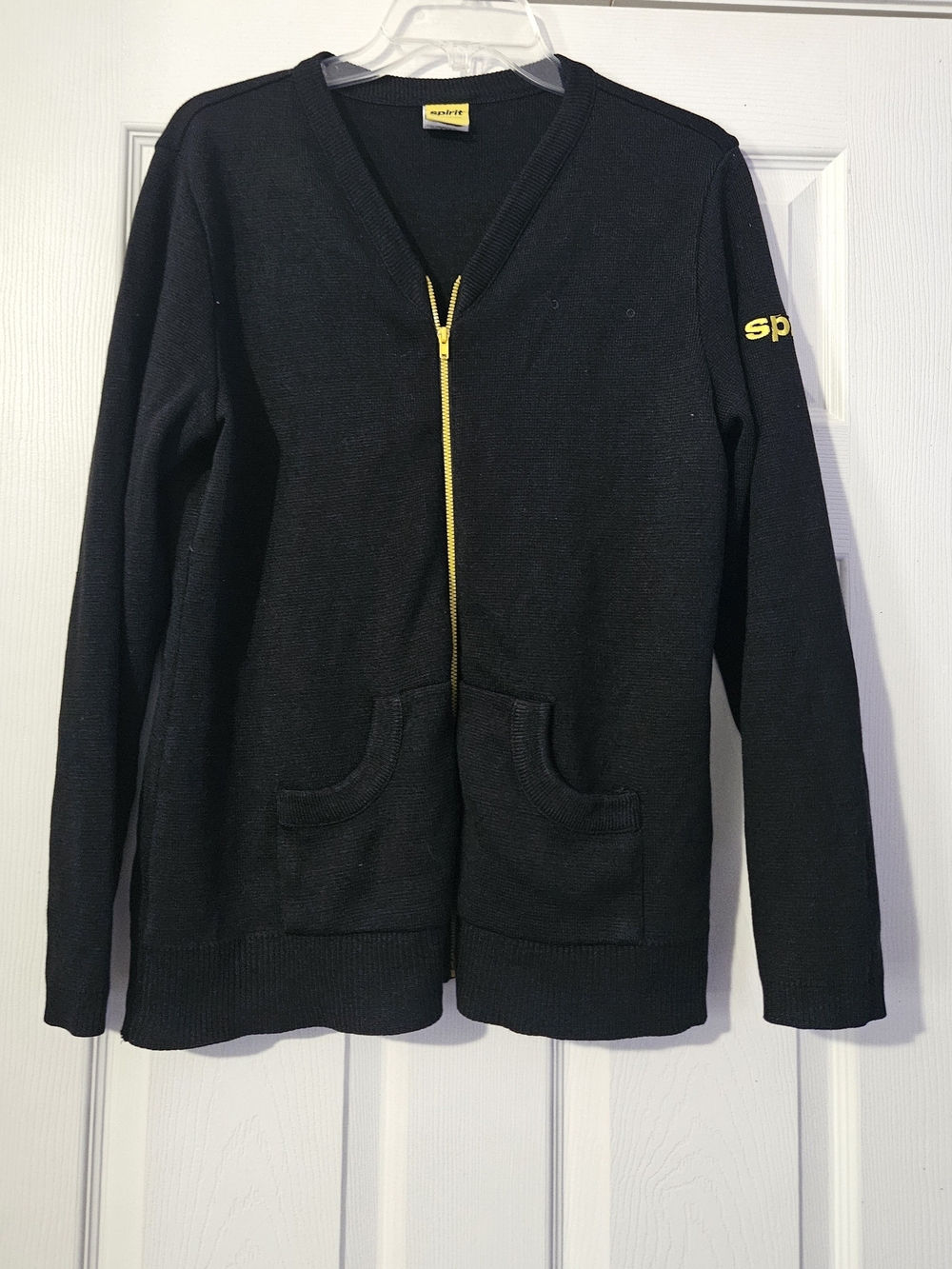 Spirit long sleeve zippered sweater is a size Large.